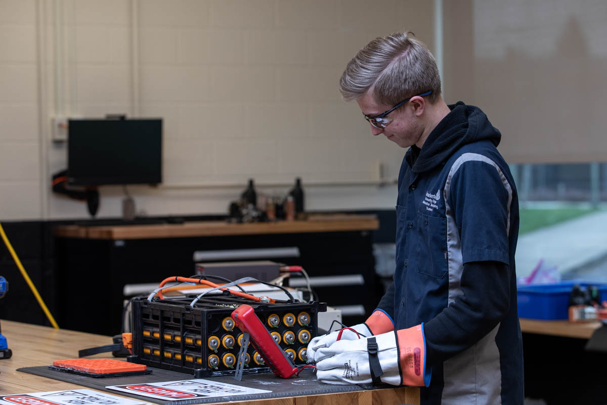 Man testing car battery